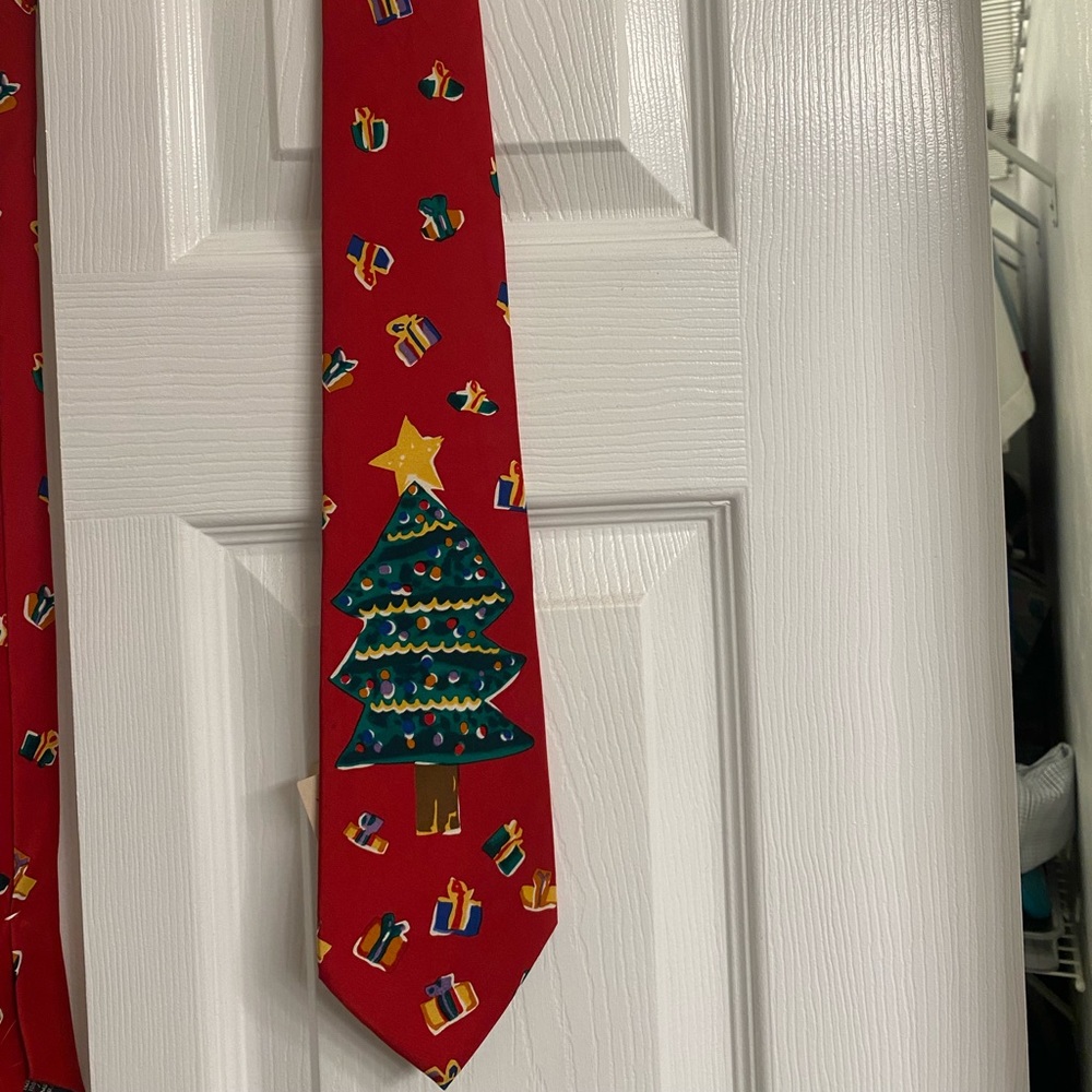Christmas tie with christmas tree theme on a red background